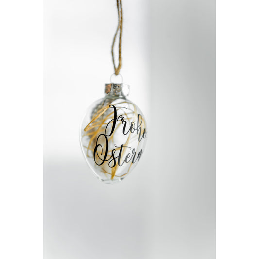 Personalisierte Ostereier aus Glas mit Perlhuhnfeder und Stroh