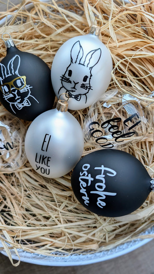 Mundgeblasenes Glasosterei mit Motiv oder Spruch